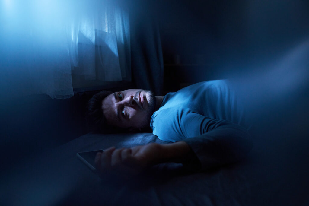 It's 3:00 am and a man is awake in bed
